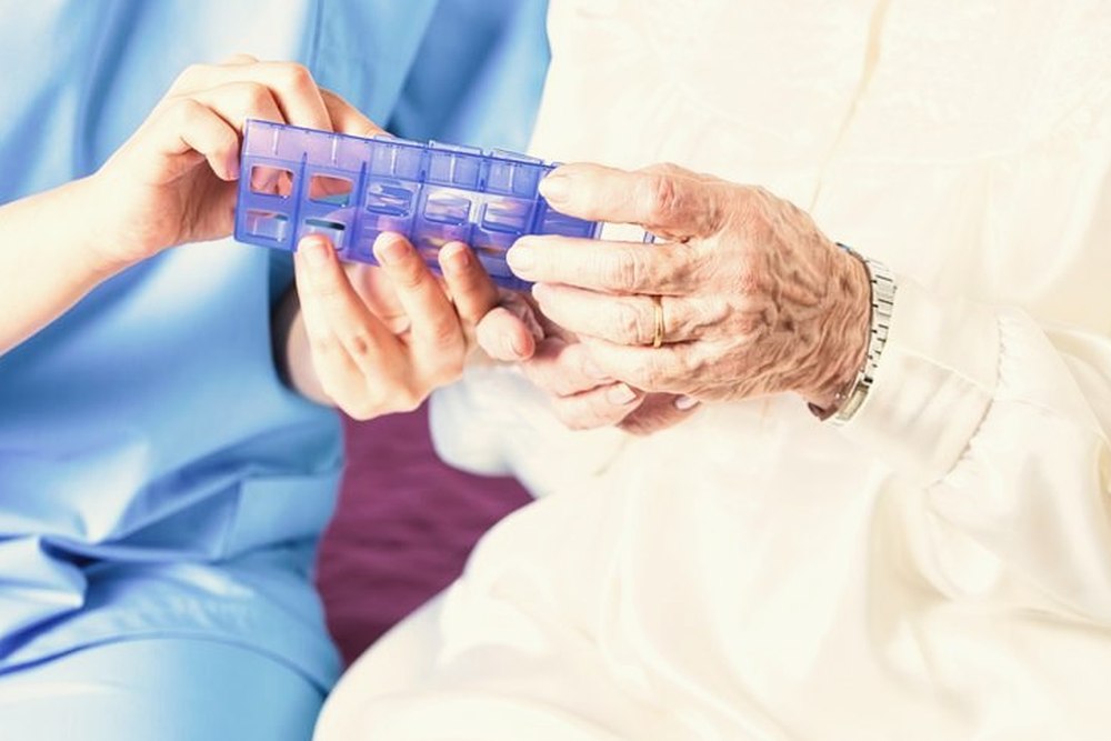 A weekly dose administration aid being filled